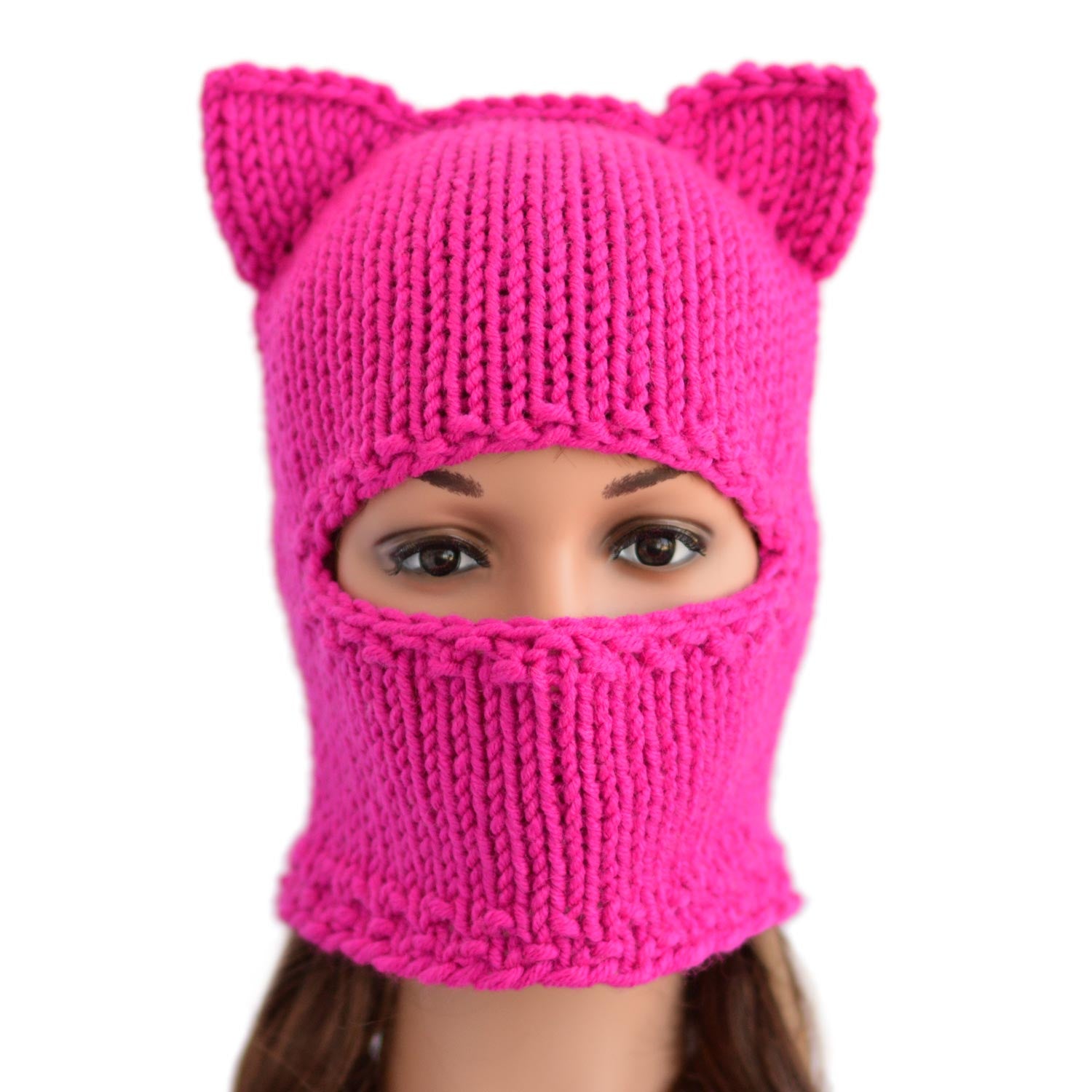 Cat ear balaclava in hot pink / bright pink. Lightweight, comfortable cat ear beanie will keep you warm and can be used as a ski mask with cat ears. There are three ways to wear this cat ear hat, your nose can be covered or uncovered or your face can be completely open.