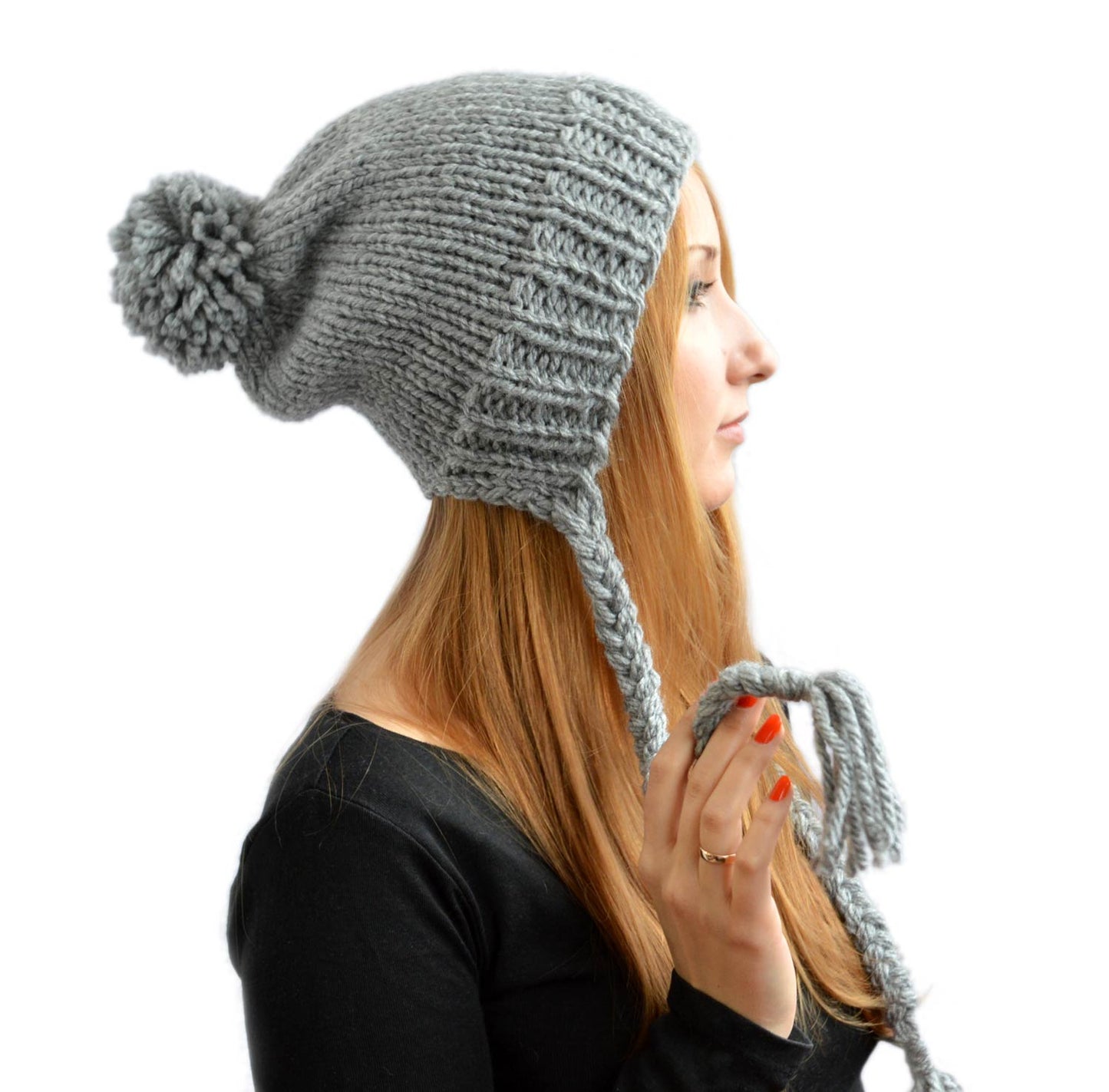 Tassel hat with pom pom and braids / pigtails in grey color. Choose yours custom color for your slouchy beanie with tassels. Hat with braids and wide band is made of thick threads, warm and cozy. Bonnet femme, pom pom hat by StopFrost. 